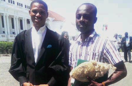  Mr Asante (right) with human rights lawyer, Francis Xavier Sosu, after the hearing.