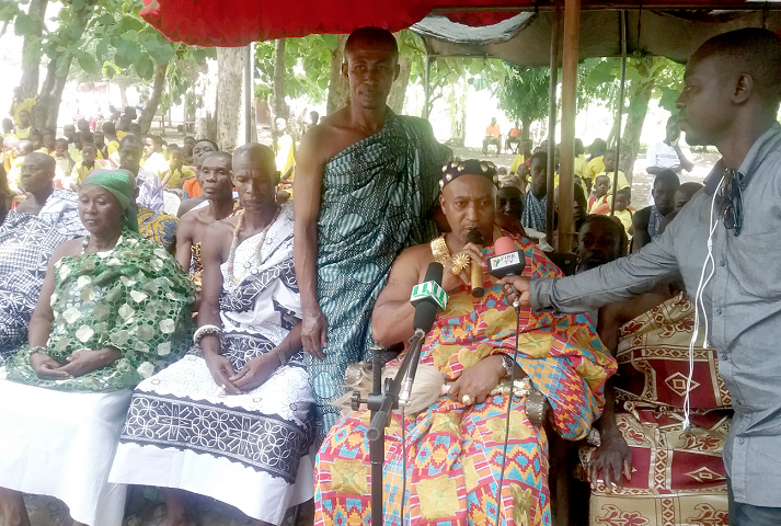 Nana Atakora Bonsra speaking during the sod-cutting ceremony at Asuoho Ankaase