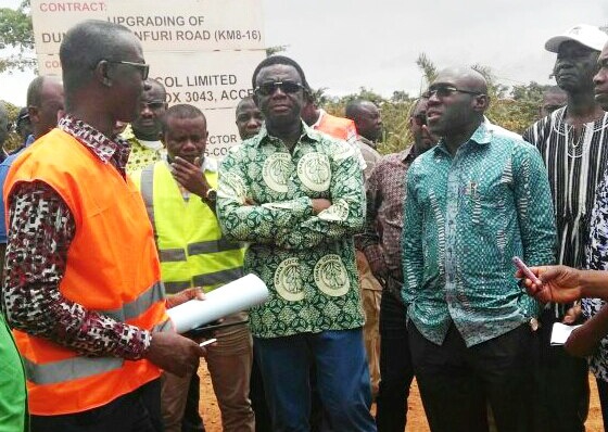 The Asanti Regional Director of Ghana Highways ,Mr Joseph Atsu Amedzeke briefing Dr Opuni (middle0  Alhaji Fuseini during the inspection of the Coco A roads in the Ashanti ,Western and Central Regions
