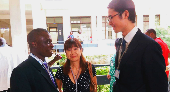 Dr Ofosu (left) interacting with two officials of JICA during the dissemination forum in Wa