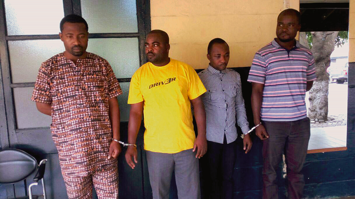 The accused persons. From left: Mark Kojo Conry, Richard Obeng Osei, Kofi Amehonu and Aikins Ameho. INSET: Some of the alleged fake gold bars