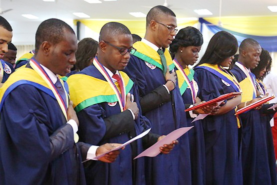 The graduating doctors taking the hippocritic oath