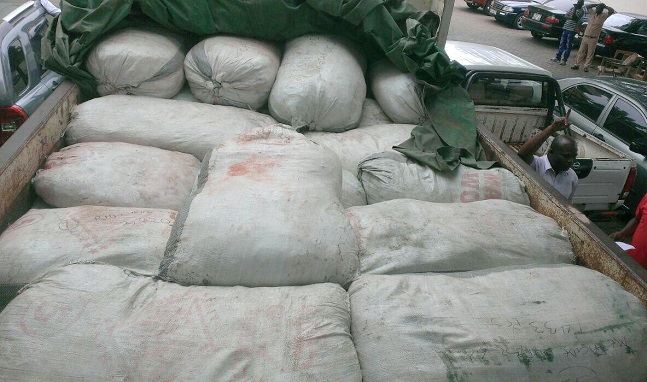 The intercepted goods concealed in sacks to be smuggled to Togo
