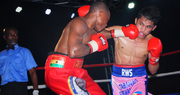  Isaac Dogboe lands a right on the chin of Tabanao. Picture: SAMUEL TEI ADANO