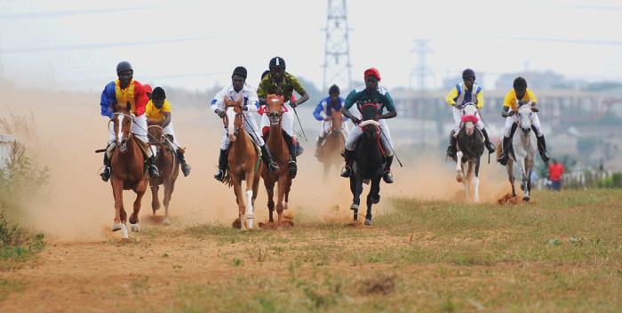   Amora (left) was ridden by Ebenezer  Adjetey to finish first in the Maidens division. Picture: Samuel  Tei Adano