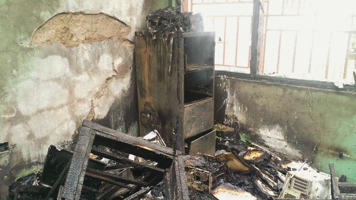 The burnt EC offices at Tepa