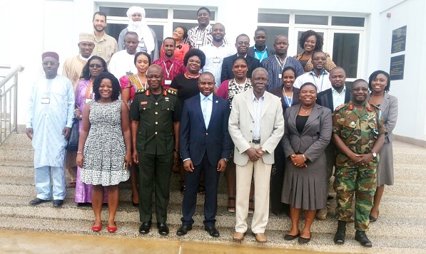 Mr Chukwuemeka B. Eze (4th left), Executive Director, WANEP, and Brig. Gen. Kotia (3rd left), Deputy Commandant, KAIPTC, with some participants. Picture: NII MARTEY M. BOTCHWAY