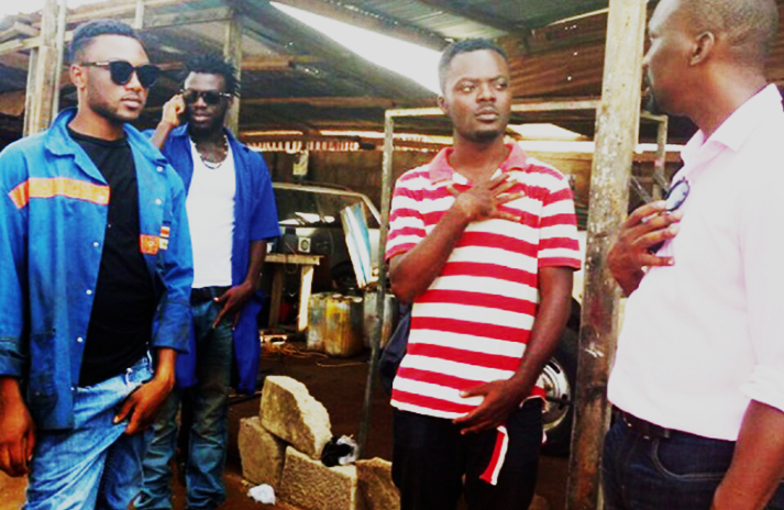 Abraham Ohene Djan(right) interacting with some of the casts on set.