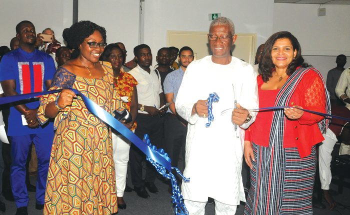  Nii Osah Mills (middle), Minister of Lands and Natural Resources, being assisted by Mrs Mawuena Trebarh and Ms Johanna Odonkor Svanikier (right), Ghana’s Ambassador to France