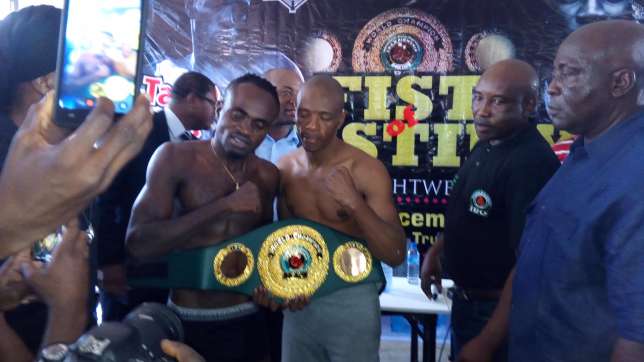 Emmanuel Tagoe (left) with Mzonke Fana (right) after the weigh-in