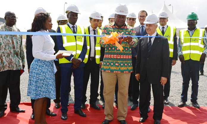 President Mahama (middle) being assisted by Mr Anas Sefriwe, CEO of CIMAF Ghana to commission the cement factory in Tema