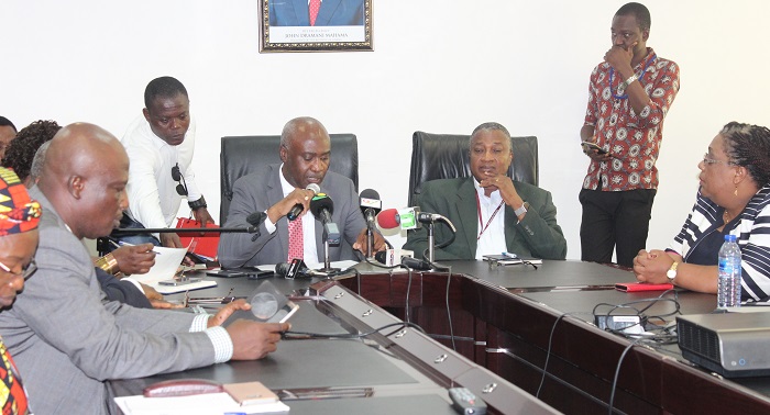 Mr Nathaniel Otoo (arrowed), CEO of the NHIS, addressing a press conference in Accra. Picture: BENEDICT OBUOBI