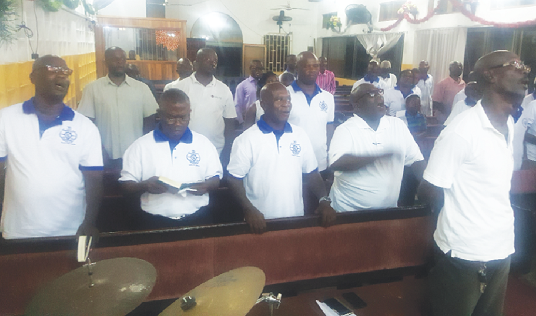 A section of the Men’s Fellowship members singing at the service