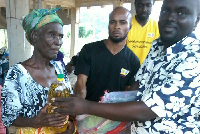 One of the widows receiving her package