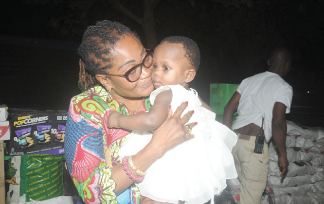  Mrs Lordina Mahama cuddling a child at the Tamale Children’s Home