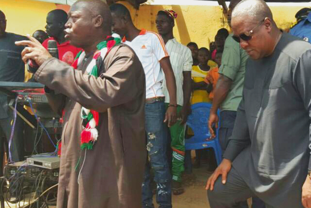 Mr Bede Ziedeng (left) introducing President Mahama (right) to his constituents during the tour of the region