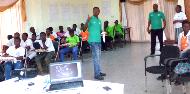 A first aid trainer of the St John’s Ambulance Ghana taking some pupils from selected public schools through basic first aid training
