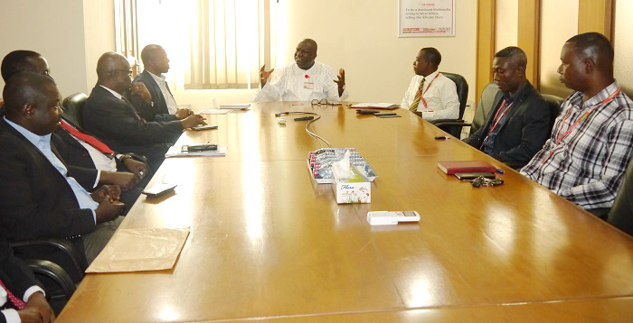 Mr Kenneth Ashigbey  holding discusions with members of the Engineering Council at office in Accra yesterday.   Those in the picture include Mr Charles Amoako (2nd right), Director of Technical Services, of GCGL, and Mr Augustine Kuire (left).   Picture: PATRICK DICKSON 