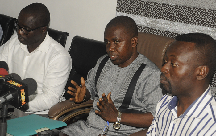  Mr Kingsley Kofi Addo (middle), Business Development Manager of Innolink Print and Packaging, addressing the press conference in Accra. Those with him are Mr Michael Quartson(right) and Mr Abraham Nartey (left), the Marking and Communications Director of the compay, respectively. Picture: GABRIEL AHIABOR