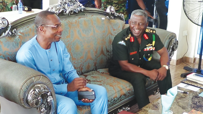 Mr Roland Affail Monney (left), GJA President, interacting with Major General Obed Boamah Akwa (right), the Chief of Army Staff. PICTURE: OWUSU INNOCENT.