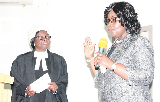 A High Court Judge, Mrs Justice Georgina Mensah-Datsa (left), swearing  in Rev (Mrs) Patricia Sappor (right).  Picture: MAXWELL OCLOO