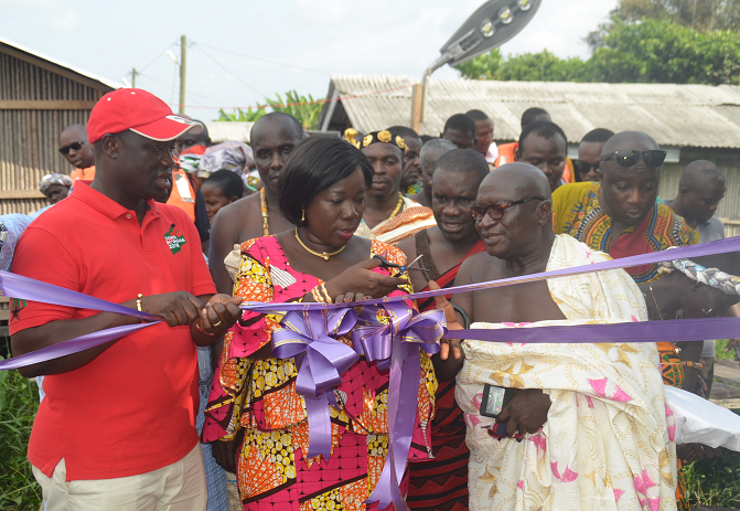 by  Mrs Elizabeth Ofosu-Agyare, the Minister of Tourism inaugurating the facility. With her are some chiefs and the Minister of Petroleum, Mr Emmanuel Armah-Kofi Buah (left)