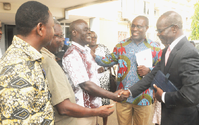 Dr Papa Kwesi Nduom (right), in a handshake with Mr Richard Ampabeng (3rd left), General Secretary, Public Service Workers Union, at a meeting with the Ghana Trades Union Congress (TUC) in Accra. Those  with them are Dr Yaw Baah (2nd right), Secretary General of the TUC, and other officials. Picture: GABRIEL AHIABOR