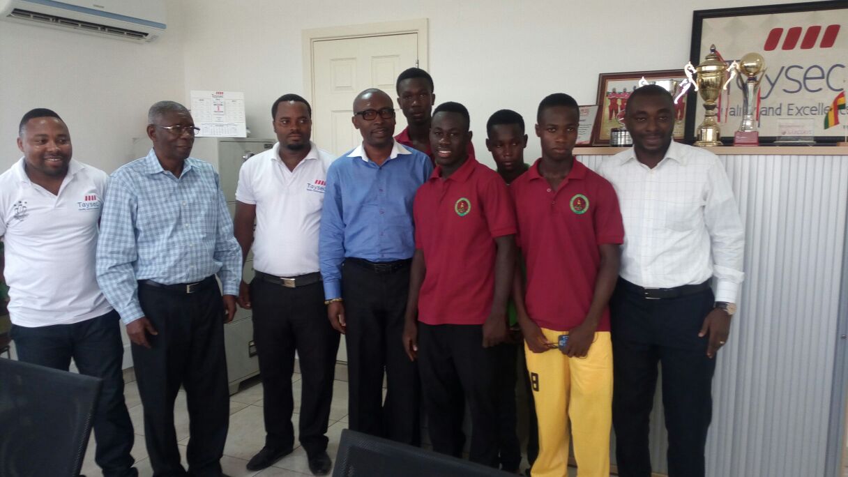 Mr Abebrese (second from left) poses with players and officials of Nsromma Cricket Academy