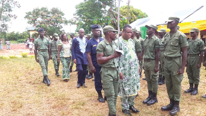  Mr Kor (3rd right) being led by Rev. DCOP Ampah-Bennin to inspect a guard of honour mounted by the school’s cadet