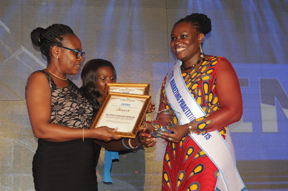 Ms Shirley Acquaah-Harrison (right), Director, Marketing and Sales, GCGL, receiving her award for being adjudged the marketing practitioner of the year (woman) from Dr (Mrs) Shola Sarfo-Duodu, Immediate Past President, CIMG 