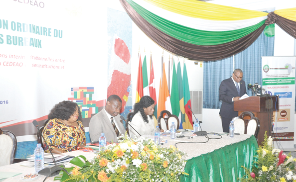Mr Emmanuel Bombande (standing), the Deputy Minister of Foreign Affairs and Regional Integration,  addressing the participants