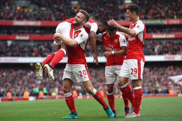 Arsenal move joint top of the Premier League with Man City