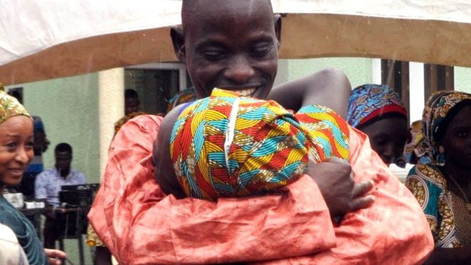Freed Chibok girls reunite with families
