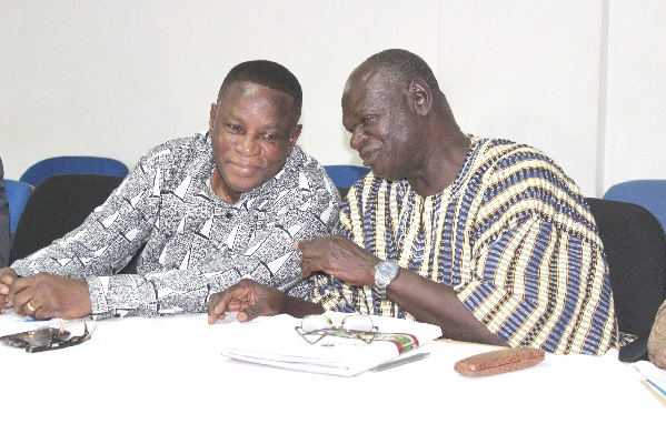 • Mr Mike K. Garbah (left), Commissioner, Public Service Commission interacting with Mr David Yaro, the Administrator General of presidential estates during the press conference. Picture: BENEDICT OBUOBI