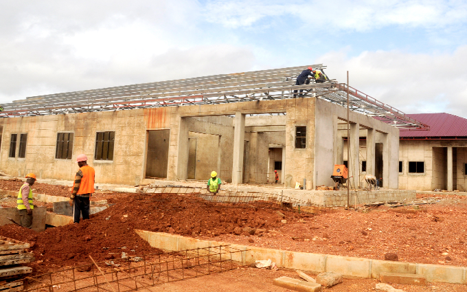 The 60-bed hospital at Nsawkaw at various stages of completion. Pictures: GABRIEL AHIABOR