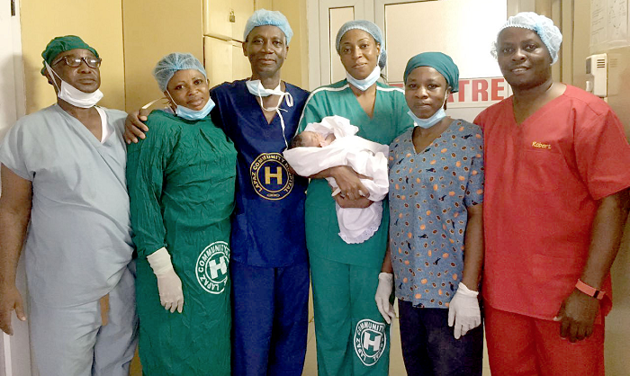  The medical team with one of the babies