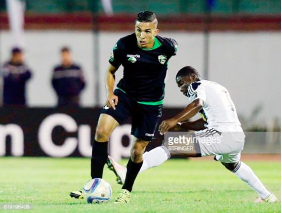 • Mazembe's Morgan Betorangal tries to stop Bejaia's Yacine Salhi (left) during iast Saturday’s match