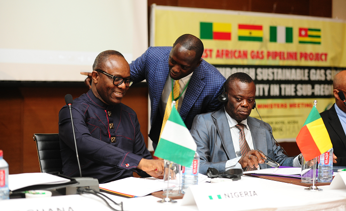  Mr Emmanuel Armah-Kofi Buah (middle), the Minister of Petroleum,  interacting with Dr Emmanuel Ibe Kachikwu (left), Nigeria Petroluem Minister. With them is Mr Alexis Gbagyuidi, a representative of Benin. Picture: EMMANUEL QUAYE