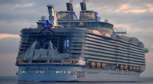 One crew member has died and four others are injured in an accident on the Harmony of the Seas, the world's biggest cruise liner