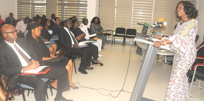   Ms Sherry Ayittey (right), Minister of Fisheries and Aquaculture Development, addressing the judges, Magistrates and state Attoneys  at the workshop in Accra.