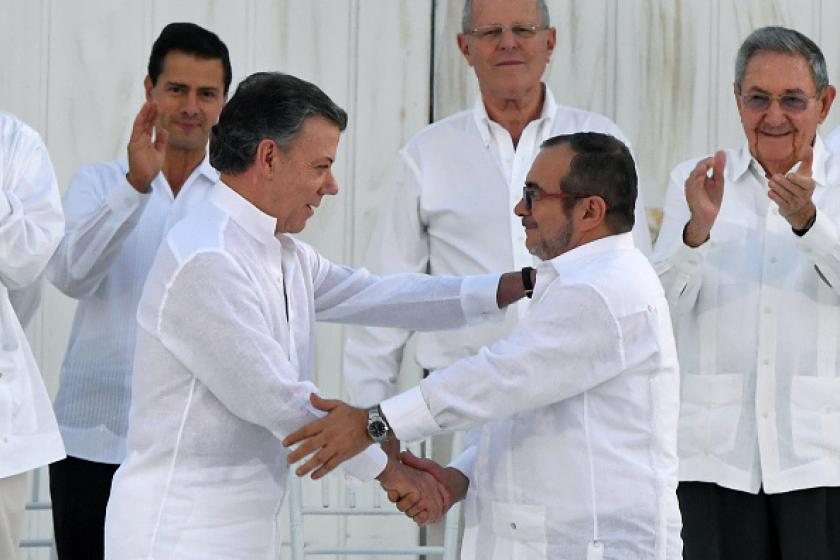 Colombia and FARC sign historic pact ending 52-year war