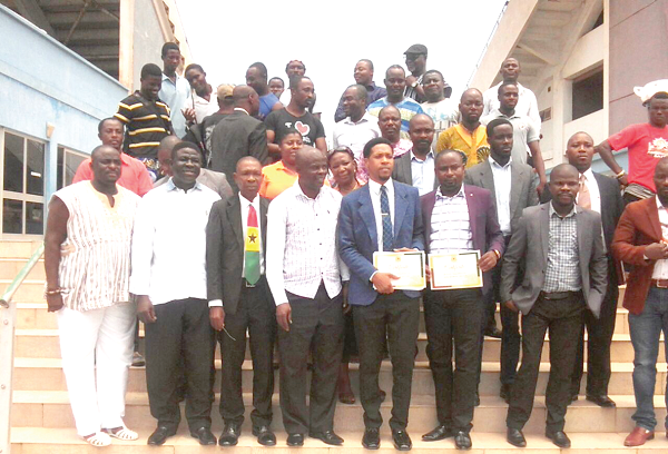 Charles O. Asibey (arrowed) in a group photograph with members of the NSA after the inaugration