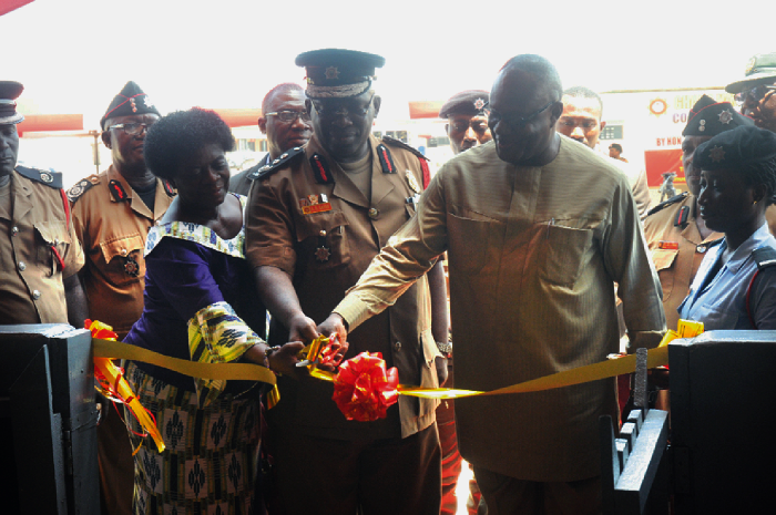 Mr Prosper Bani (right), the Minister of the Interior, together with Dr Albert Brown Gaisie (2nd left), National Chief Fire Officer, GNFS, cutting the tape to officially inaugurate the fire service medical centre at the GNFS Training School at James Town in Accra. Picture: EMMANUEL ASAMOAH ADDAI