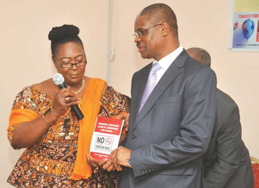 Ms Tina Mensah, Deputy Minister Minister of Health and Dr Owen Kaluwa, WHO representative in Ghana jointly launching the smoking Cessation Guidelines.