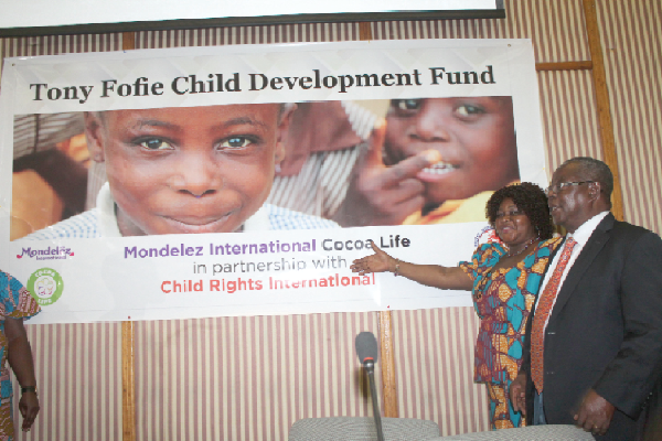 • Mrs Margaret Okai (2nd right), Director of Early Childhood Education, Ghana Education Service, and Mr Anthony Fofie (right), Former Chief Executive Officer of COCOBOD, launching the Tony Fofie Child Development Fund.  Picture: EDNA ADU-SERWAA
