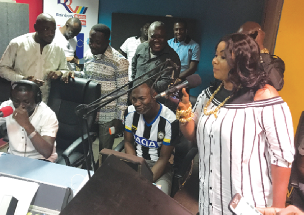Agyeman (in white shirt) surrounded by the celebs