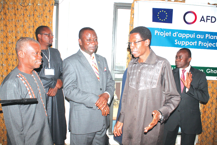 • Mr Salifou Ousseini (right), Executive Director of ARAA/CEDEAO, interacting with Mr George Oduro (2nd left), a Deputy Minister of Food and Agriculture, and Mr Ebenezer Aboagye (left), Ag Director of PPRSD Ghana. With them is Dr Victor Agyemang (back right), Director General of CSIR. Picture: Maxwell Ocloo