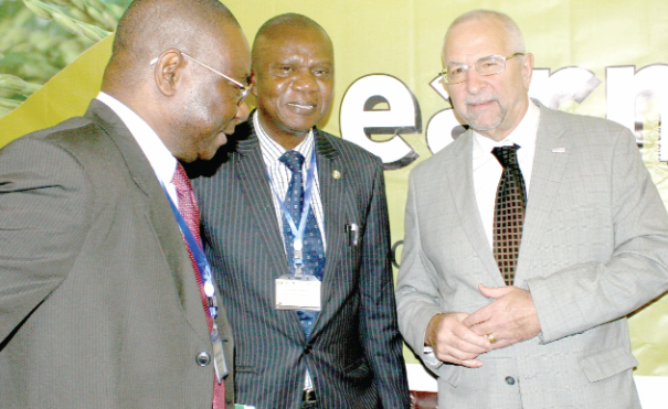 Mr Alexandre Deprez (right) explaining a point to some officials after the workshop. Picture: INNOCENT K. OWUSU