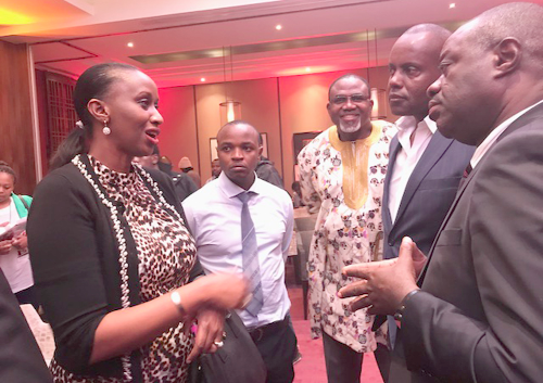 Hon. Ibrahim Mohammed Awal interacting with a businesswoman of the Capital Club in Kenya