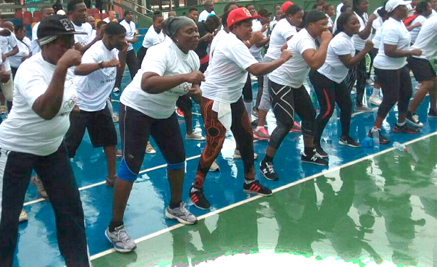 Participants going ­through some exercising drills during the Olympic Day celebration last Saturday